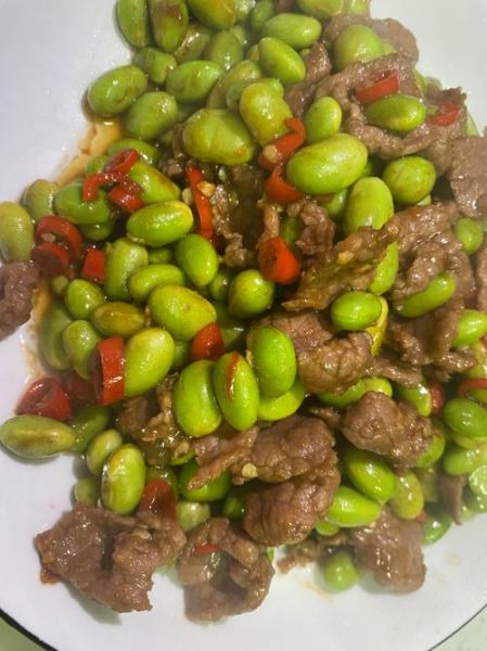 毛豆炒肉丝怎么炒才入味_毛豆炒肉丝家常做法