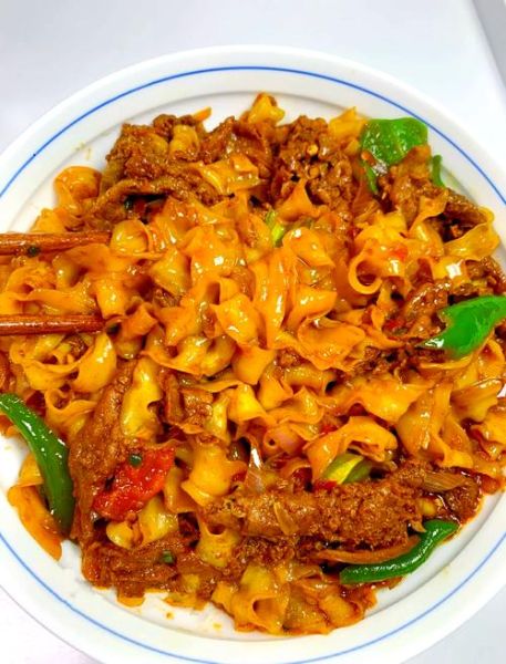 炒刀削面怎么做好吃_家常刀削面做法窍门