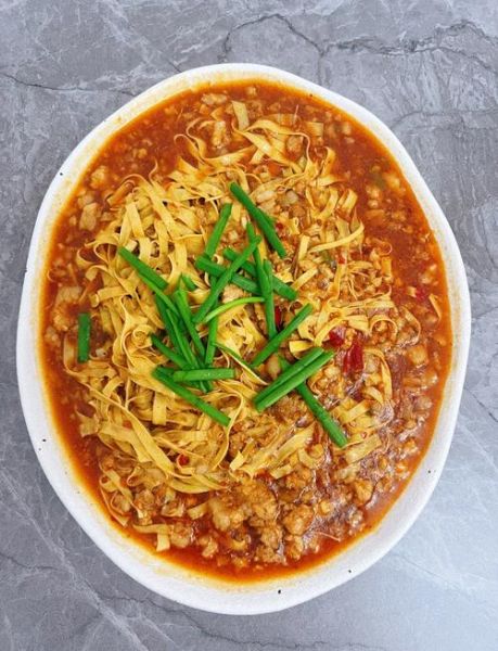 干豆腐卷肉馅怎么做_干豆腐卷肉馅的家常做法