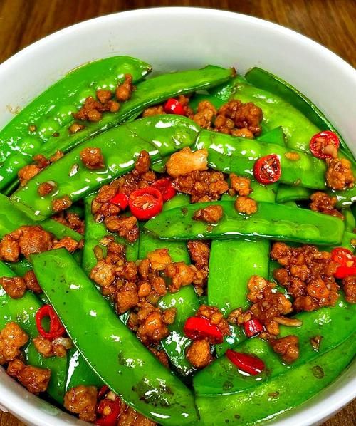 炒荷兰豆怎么炒才脆_荷兰豆焯水几分钟