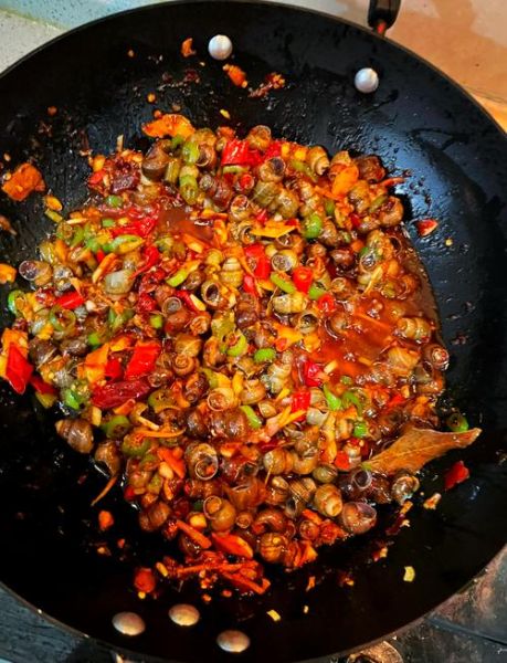 田螺怎么清洗才干净_田螺炒多久才入味