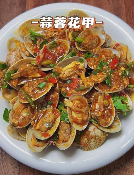 蒜香花甲怎么做_花甲焯水还是直接炒